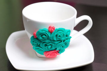 Mug, decorated with flowers made of polymer clay. Crafts from polymer clay. Mug decorated with...