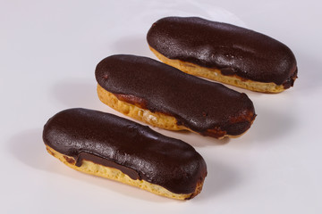 Tasty eclair with cream
