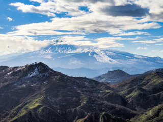 Snowy Etna volcano view