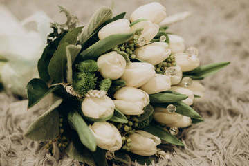 White wedding bouquet with boho decor