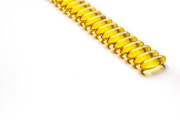  Omega-3 fish fat oil capsules on a white background. 