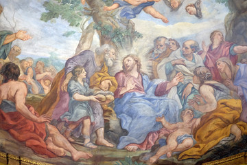 Obraz na płótnie Canvas The fresco of The Miracle of Multiplication on the main apse of Basilica di Sant Andrea delle Fratte, Rome, Italy 