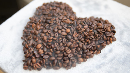 Coffee beans on a nice smooth background