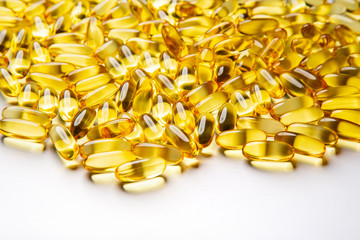  Omega-3 fish fat oil capsules on a white background. 