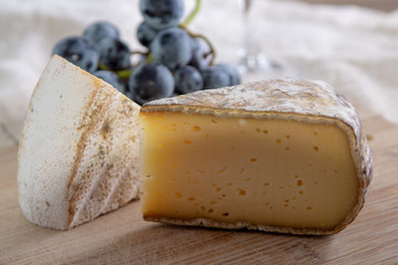 French hard cow or goat cheese Tomme or Tome, produced in French Alps