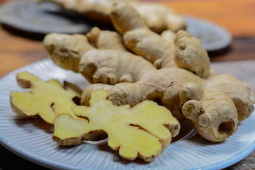 Fresh raw ginger root from China close up