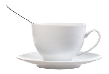 side view of white cup with spoon and saucer