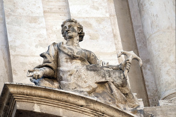 Angel on facade of San Marcello al Corso church in Rome, Italy 