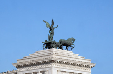 Naklejka premium Statue of the goddess Victoria riding on quadriga, National Monument of Victor Emmanuel II, Rome, Italy 