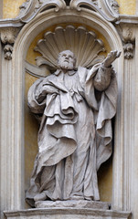 Fototapeta premium Saint Camillus de Lellis, facade of Santa Maria Maddalena Church in Rome, Italy 