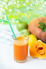 fresh juice from homemade vegetables. Carrot smoothie. Detox, vegetarianism On a bright summer background