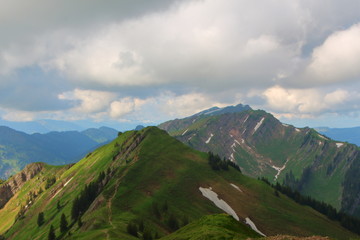 Alps peek in Germany with look on Austria. Cloudy day walk on Alps.