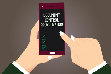 Word writing text Document Control Coordinator. Business concept for analysisaging and controlling company documents Hu analysis Hands Holding Pointing Touching Smartphone Blank Color Screen