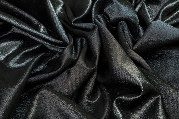  black fabric with sequins is soft folds
