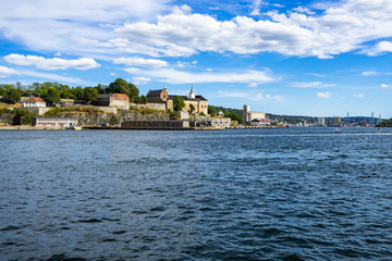 Obraz premium Oslo harbour with Akershus fortress, the medieval castle built to protect the city, Norway