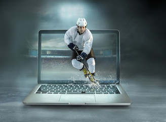  ice hockey Players in dynamic action in a professional sport game play in hockey on the laptop...