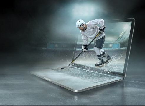  ice hockey Players in dynamic action in a professional sport game play in hockey on the laptop under ice rink