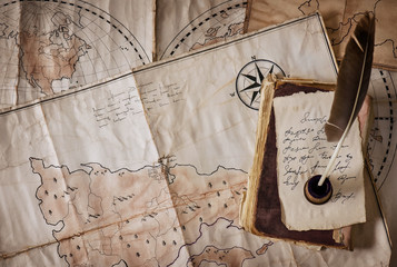 Old book and letters on a background of old vintage cards.