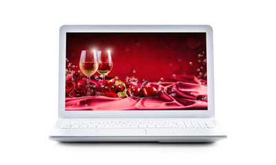 Valentine or wedding image in a screen of a laptop isolated on white background