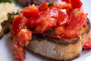 Tomato bruschettas, vegetarian bruschettas.