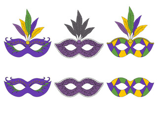Collection of hand drawn masks. Isolated on white. Mardi gras. Vector illustration. © leya1703100