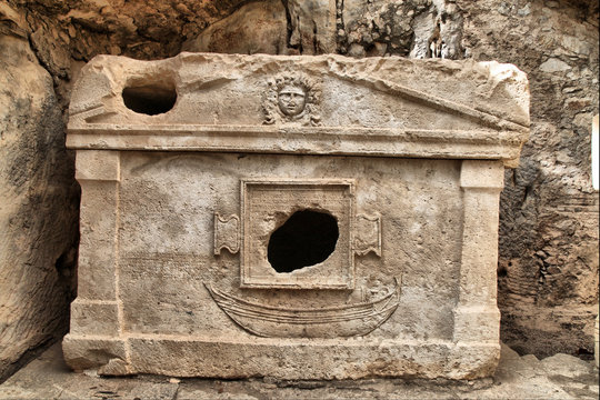 Old Roman Carved stone sarcophagus in Olympos ancient city, Antalya, Turkey.