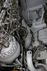 Motor. A large number of tubes, metal surface. Spaceship.