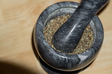 Mortat with hemp seeds inside.