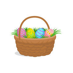 Painted Easter eggs and green grass in wicker basket. Spring holiday. Religious symbol. Flat vector design
