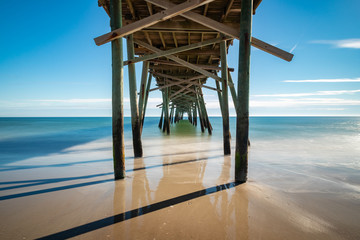 Fototapeta premium Long Exposure under Pier in Atlantic Beach, North Carolina Damaged by Hurricane Florence