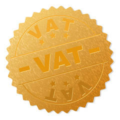 VAT gold stamp award. Vector golden award with VAT text. Text labels are placed between parallel lines and on circle. Golden area has metallic structure.