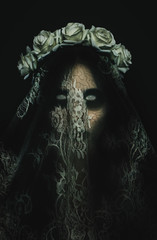 Creepy corpse zombie bride with white empty eyes on black background