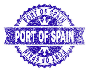 PORT OF SPAIN rosette stamp seal watermark with grunge style. Designed with round rosette, ribbon and small crowns. Blue vector rubber print of PORT OF SPAIN label with retro style.