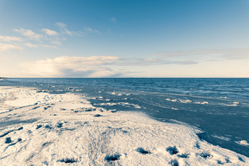 ocean view at the  beach in a minimalist wintry composition 