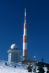 Radio transmission tower and snow-covered trees on Mt Brocken, Harz, Saxony-Anhalt, Germany, Europe