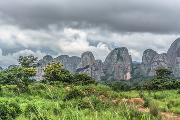 View of a tropical landscape, with forest and mountains Pungo Andongo, Pedras Negras , black stones, huge geologic rock elements, Angola