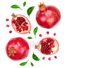 pomegranate with leaves isolated on white background with copy space for your text. Top view. Flat lay pattern