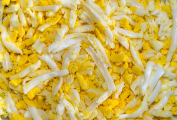 Grated hard boiled eggs,  for food backgrounds or textures.