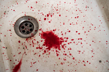 Bloody in sink with flowing red blood. Murder concept background