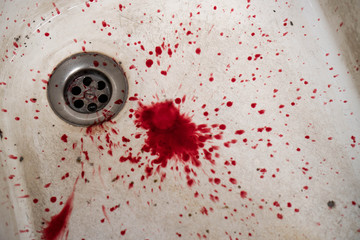 Bloody in sink with flowing red blood. Murder concept background