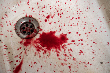 Bloody in sink with flowing red blood. Murder concept background