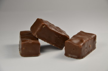 chocolate with nuts isolated on white