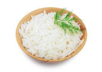 rice in a wooden bowl isolated on white background. Top view. Flat lay