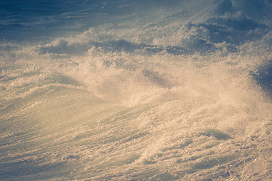 background image of waves crashing in the sea