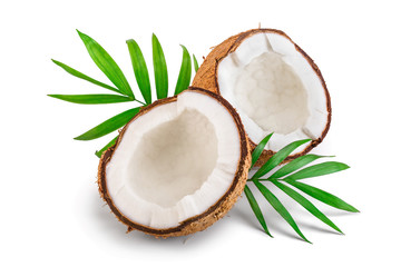 half of coconut with leaves isolated on white background