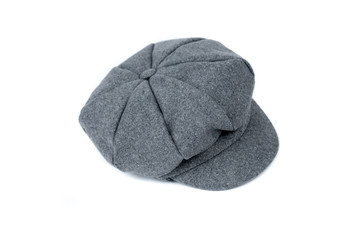 Vintage gray hat on white background. Vintage woolen cap. Man’s accessories: hat.  Front, top view.