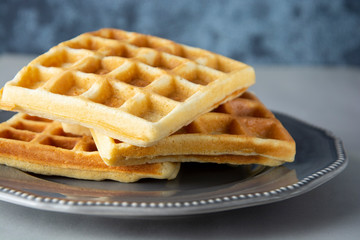 Belgium waffles close up. Homemade breakfast, delcious dessert for children.
