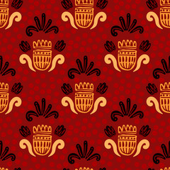 floral ornaments with brown dots on a light red color