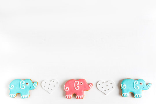 Frame for the design of a baby banner, greeting card. Background for baby banner. Children banner with elephants. Base for banner with gingerbread-elephants