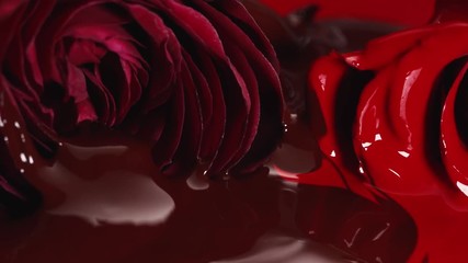 Red paint lipstick liquid texture, oil paint for painting, mixing shades, art make up cosmetic for face rose flower blossom.